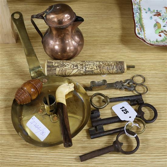 Brass covered jug, coquilla nut grater, four keys, scissor style candle snuffers and a brass candlestick